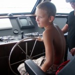Tigger at the helm of the Utila Aggressor II